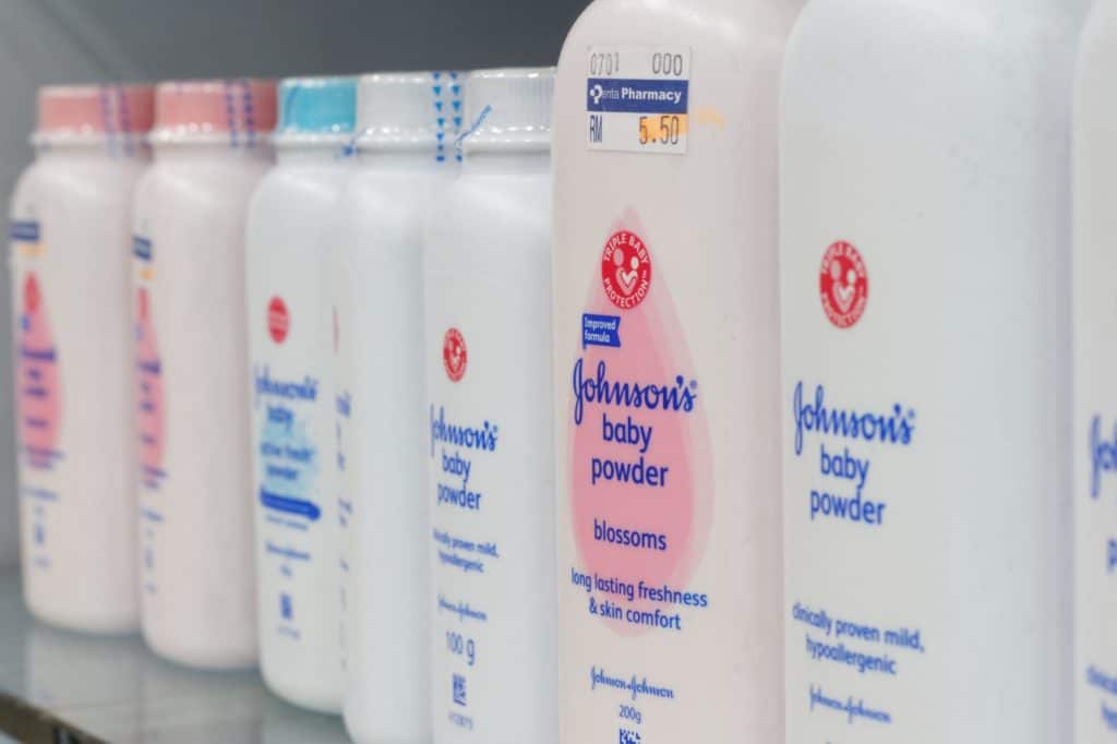 bottles of Johnson's baby powder on a shelf