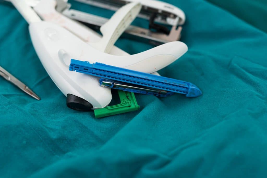 surgical stable gun on surgical table