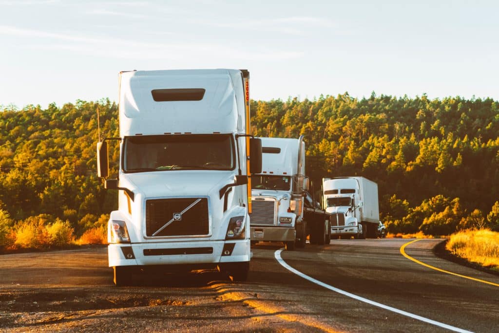 Trucks driving down the road - trucking accidents